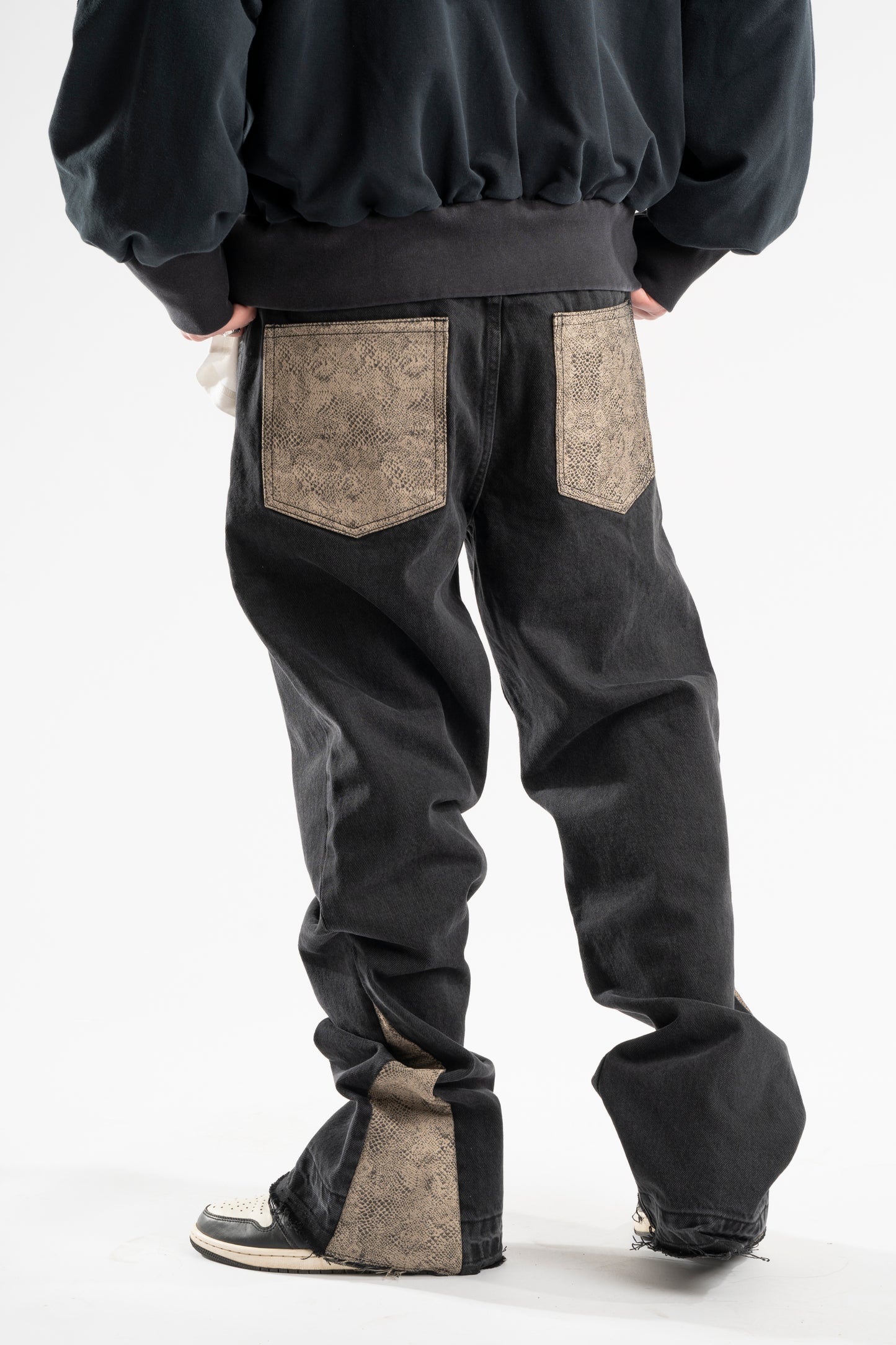 FLARED BROWN SNAKE JEANS