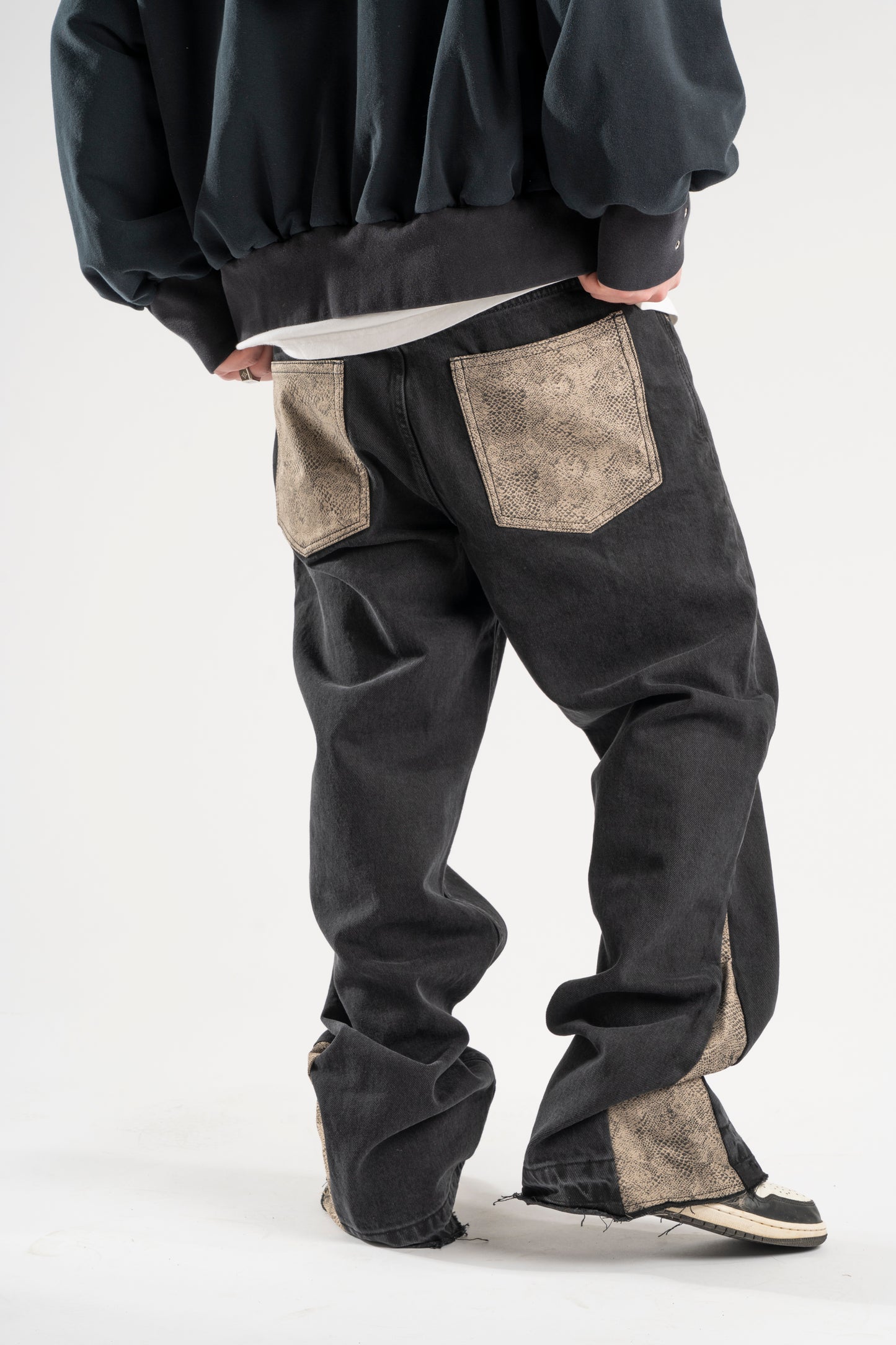 FLARED BROWN SNAKE JEANS