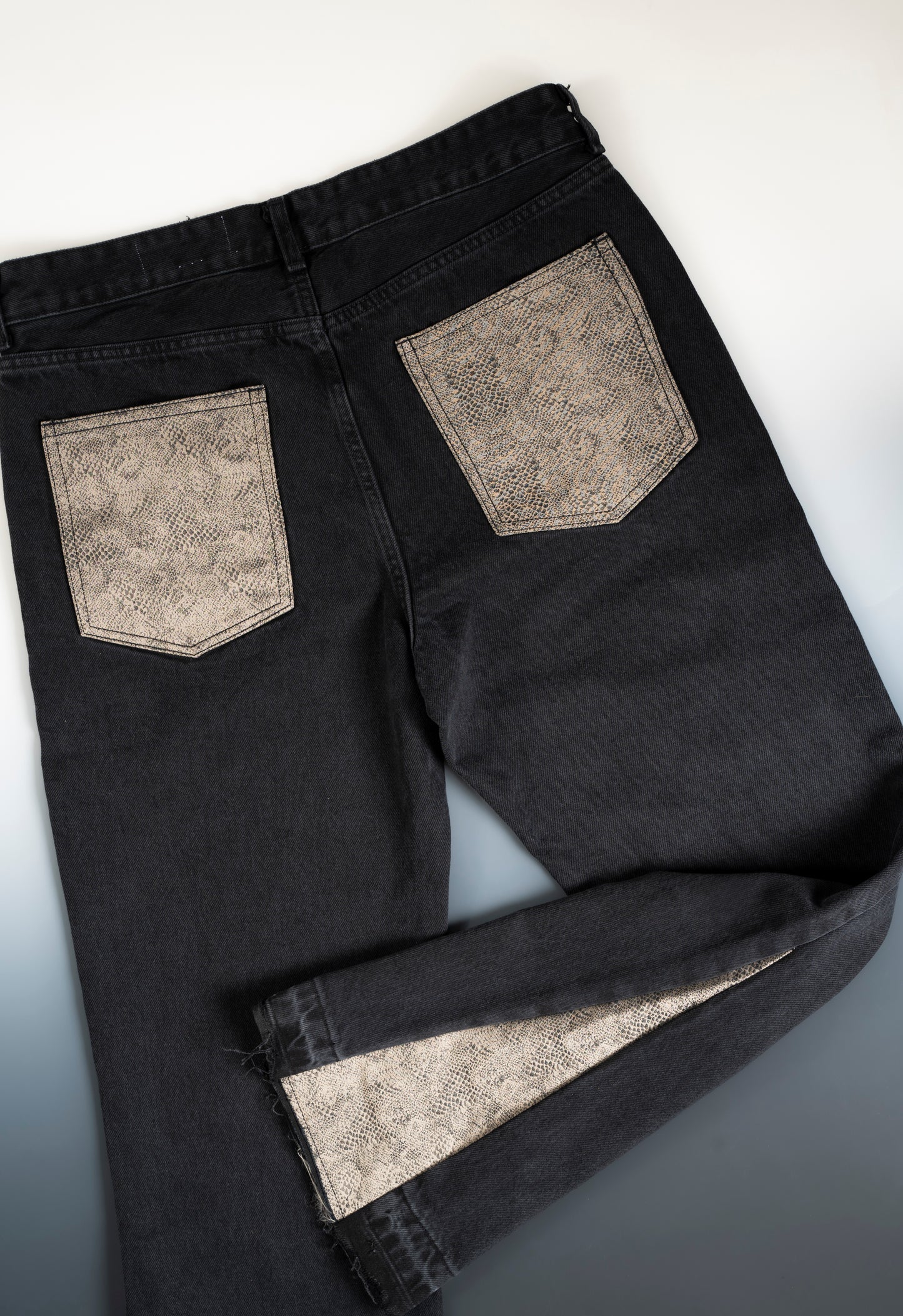 FLARED BROWN SNAKE JEANS