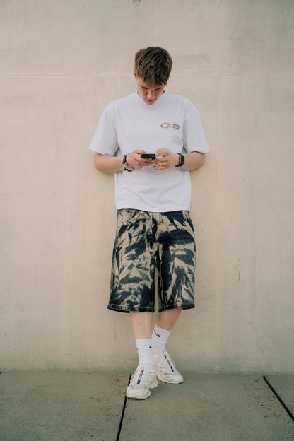 BAGGY BLEACHED BLACK SHORTS